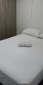 Katil atau katil-katil dalam bilik di Apartamento en itagui