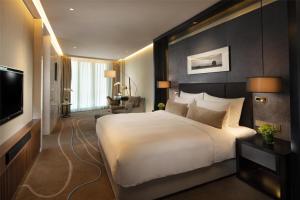 TV a/nebo společenská místnost v ubytování Sunrise Kempinski Hotel Beijing