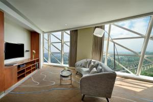 TV a/nebo společenská místnost v ubytování Sunrise Kempinski Hotel Beijing