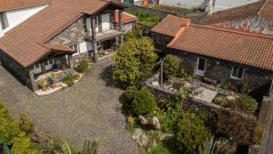an aerial view of a house with a yard at Azores Element in Livramento