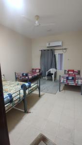 Postel nebo postele na pokoji v ubytování Gulf Gateway Hostel