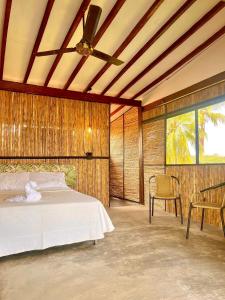 Postel nebo postele na pokoji v ubytování Finca Hotel Doradal