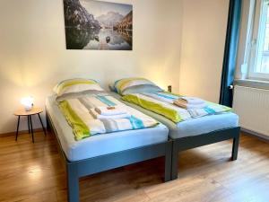 Katil atau katil-katil dalam bilik di FeWo 2 - Rödental-Apartments