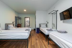 Postel nebo postele na pokoji v ubytování Das Schreder Hotel