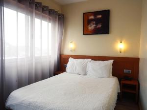 Cama ou camas em um quarto em Hotel São Francisco