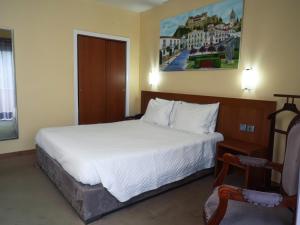 Cama ou camas em um quarto em Hotel São Francisco