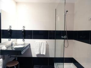 Um banheiro em Hotel São Francisco