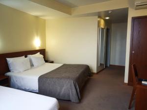 Cama ou camas em um quarto em Hotel São Francisco