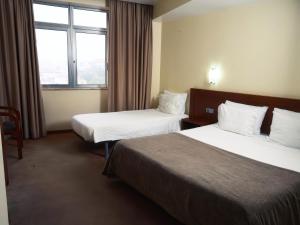 Cama ou camas em um quarto em Hotel São Francisco