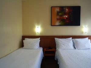 Cama ou camas em um quarto em Hotel São Francisco