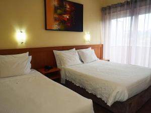 Cama ou camas em um quarto em Hotel São Francisco