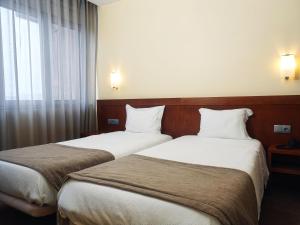 Cama ou camas em um quarto em Hotel São Francisco