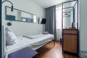 Postel nebo postele na pokoji v ubytování Das Schreder Hotel + 37 fotografií
