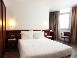 Cama ou camas em um quarto em Hotel São Francisco