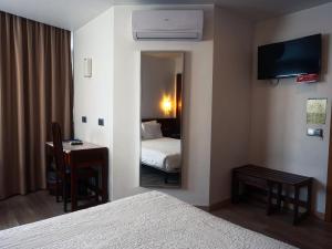 Cama ou camas em um quarto em Hotel São Francisco