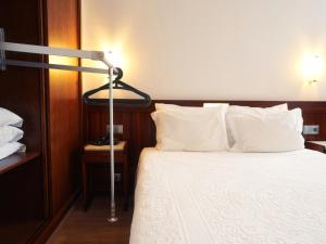 Cama ou camas em um quarto em Hotel São Francisco