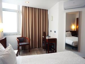 Cama ou camas em um quarto em Hotel São Francisco