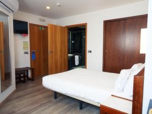 Cama ou camas em um quarto em Hotel São Francisco