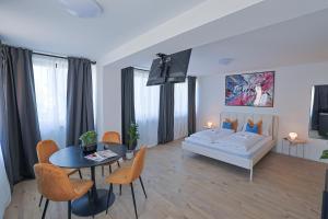 Ένα ή περισσότερα κρεβάτια σε δωμάτιο στο Kassel Rooms