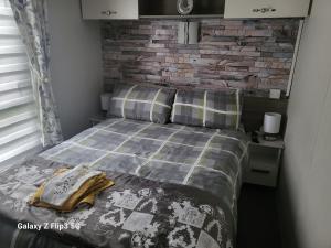 Voodi või voodid majutusasutuse MLR at Craig Tara Bay View toas