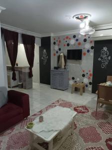 TV a/nebo společenská místnost v ubytování ايدون هاوس + 9 fotografií