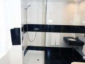 Um banheiro em Hotel São Francisco