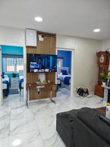 TV a/nebo společenská místnost v ubytování Relax House Barcelone