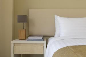 Postel nebo postele na pokoji v ubytování Bristoria Hotel Erbil