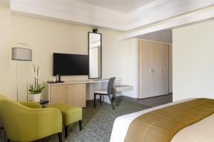 TV a/nebo společenská místnost v ubytování Bristoria Hotel Erbil