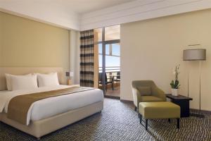 Postel nebo postele na pokoji v ubytování Bristoria Hotel Erbil