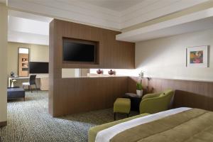 TV a/nebo společenská místnost v ubytování Bristoria Hotel Erbil