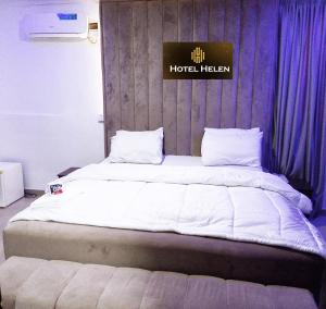 Voodi või voodid majutusasutuse Hotel Helen toas