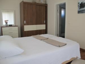 Postel nebo postele na pokoji v ubytování Crescent Villa