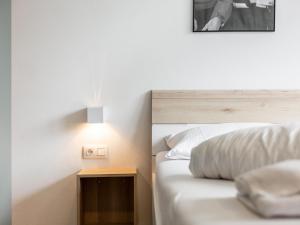 Posteľ alebo postele v izbe v ubytovaní Gletschertraum