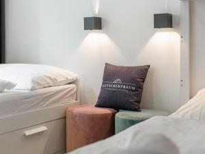 Posteľ alebo postele v izbe v ubytovaní Gletschertraum