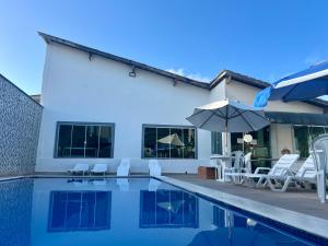 Bazén v ubytování Oasis Praia Hotel nebo v jeho okolí