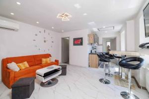 a living room with a couch and a kitchen at Apartment in Bribir 50595 in Bribir