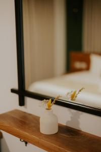 Postel nebo postele na pokoji v ubytování Goland Hotel