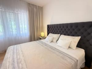Postel nebo postele na pokoji v ubytování Green Park Apartments