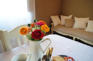 A bed or beds in a room at Casale Dolci Dimore