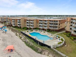 an aerial view of an apartment complex with a swimming pool at Sea La Vie- Oceanfront Family Retreat in North Topsail Beach