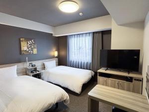 TV o dispositivi per l'intrattenimento presso Hotel Route Inn Noda -Kokudo 16 Gouzoi-