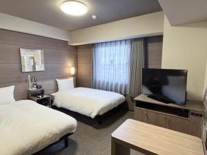 TV o dispositivi per l'intrattenimento presso Hotel Route Inn Noda -Kokudo 16 Gouzoi-