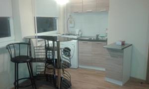 Kjøkken eller kjøkkenkrok på 1 kambario butas