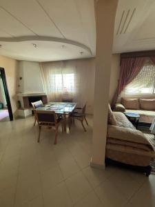 Posezení v ubytování Appartement Benslimane
