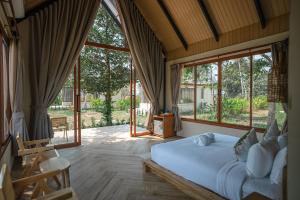 Postel nebo postele na pokoji v ubytování Moana Resort Koh Kood