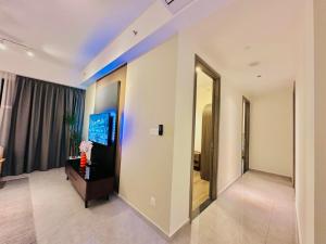 TV a/nebo společenská místnost v ubytování Agile Luxury Suite At TRX KLCC