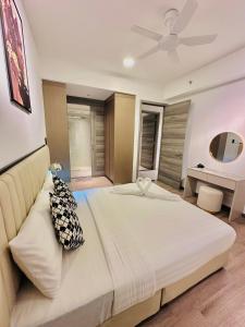 Postel nebo postele na pokoji v ubytování Agile Luxury Suite At TRX KLCC