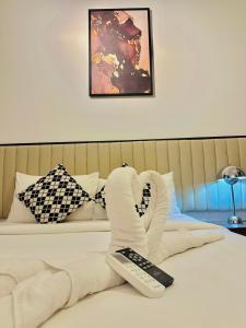 Postel nebo postele na pokoji v ubytování Agile Luxury Suite At TRX KLCC