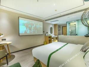 Ένα ή περισσότερα κρεβάτια σε δωμάτιο στο GreenTree Inn Shandong Jinan Suncun New District Express Hotel +109 φωτογραφίες